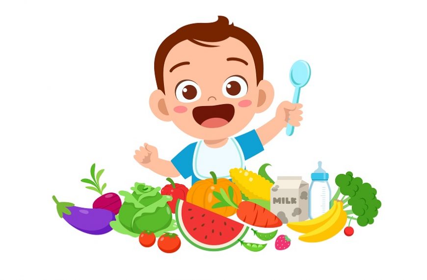 cute little baby boy eat fruit and vegetable