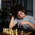 young-kid-playing-chess