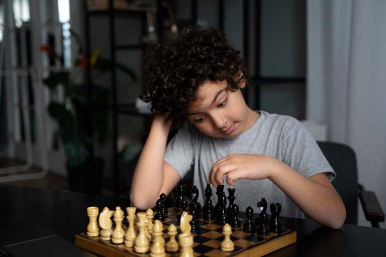 young-kid-playing-chess