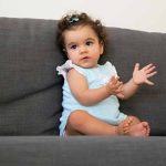 At what Age do Babies typically begin Clapping and Pointing